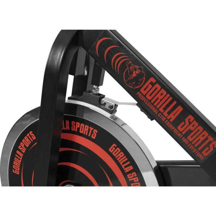 Vélo d'intérieur avec pédalier noir/rouge
